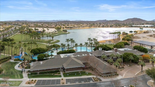 bird's eye view featuring a water and mountain view