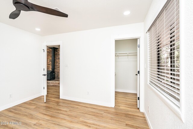 bathroom with toilet, hardwood / wood-style flooring, and vanity