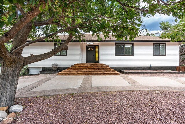 view of front of house with a patio