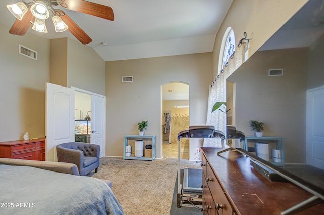 bedroom featuring carpet flooring, high vaulted ceiling, and ceiling fan