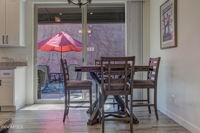 dining area with light wood-type flooring