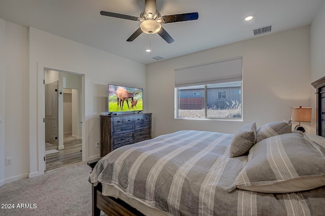 carpeted bedroom with ceiling fan