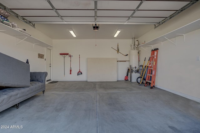 211 S Thunder Mtn, Payson, AZ 85541 - garage featuring a garage door opener and water heater