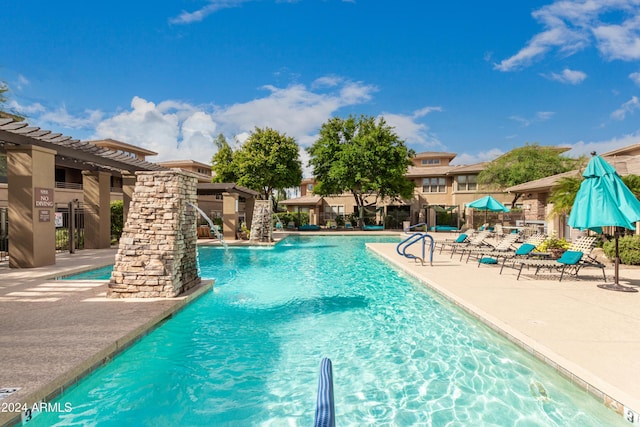 community pool featuring a patio area