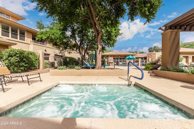 view of pool featuring playground community