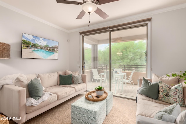 living area featuring a ceiling fan and crown molding