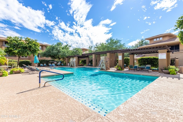 community pool featuring a patio area