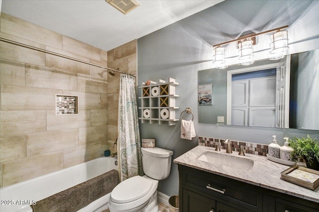 full bathroom with visible vents, shower / bathtub combination with curtain, toilet, and vanity