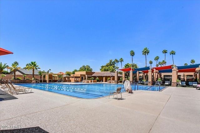pool featuring a patio area
