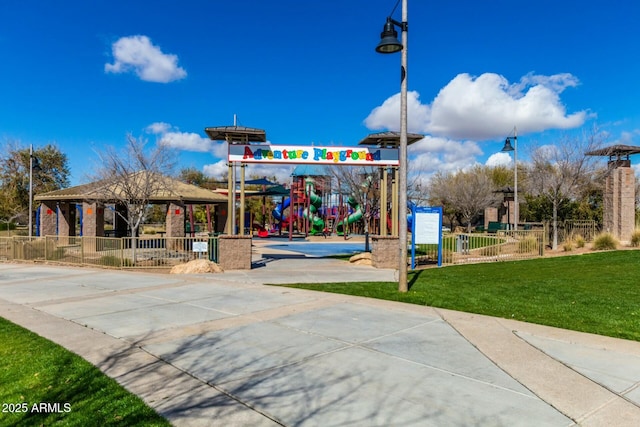 view of playground with a gazebo and a yard