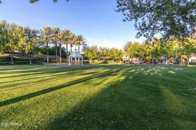 view of yard featuring a playground and a gazebo