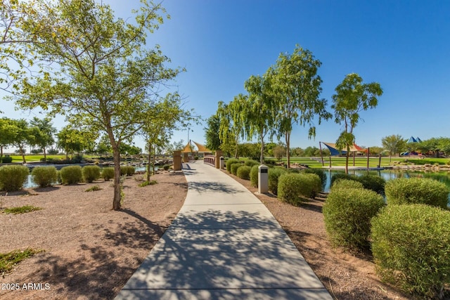 view of home's community with a water view