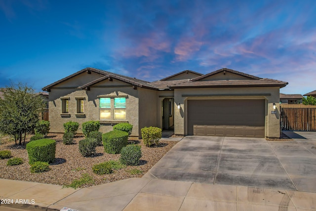 view of front of home with a garage