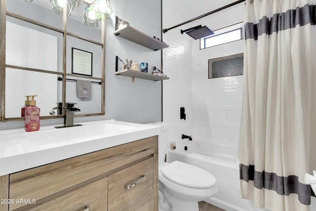 full bath with shower / bath combination with curtain, vanity, and toilet