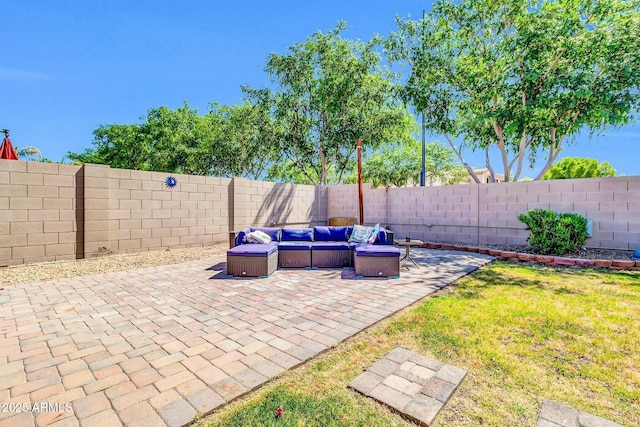 view of patio with a fenced backyard and an outdoor living space