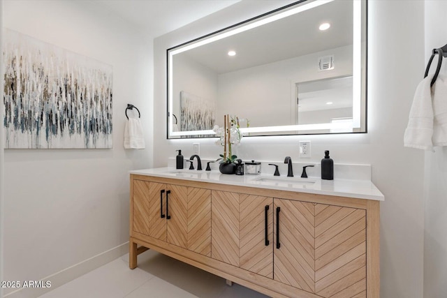 bathroom featuring vanity and tile patterned flooring