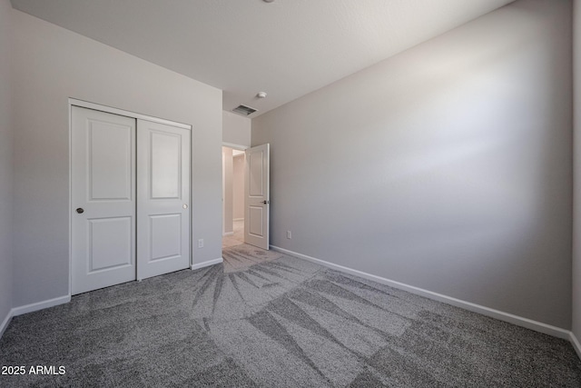 19115 N Los Gabrieles Way, Maricopa, AZ 85138 - unfurnished bedroom with carpet, baseboards, and a closet