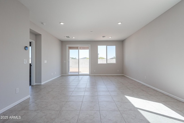 19115 N Los Gabrieles Way, Maricopa, AZ 85138 - empty room featuring light tile patterned flooring, recessed lighting, and baseboards