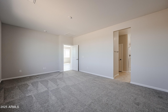 19115 N Los Gabrieles Way, Maricopa, AZ 85138 - empty room with light carpet and baseboards