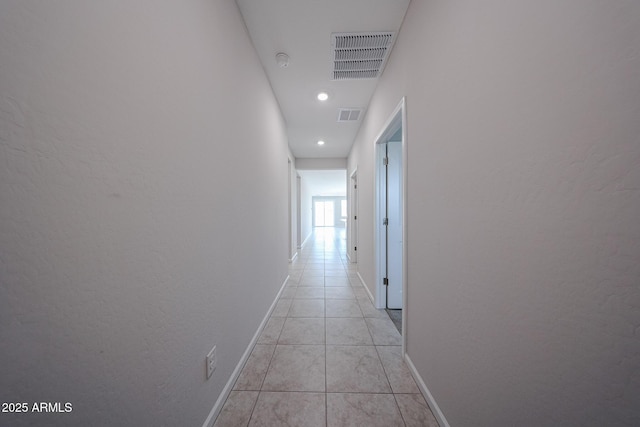 19115 N Los Gabrieles Way, Maricopa, AZ 85138 - hall featuring light tile patterned floors, baseboards, recessed lighting, and a textured wall