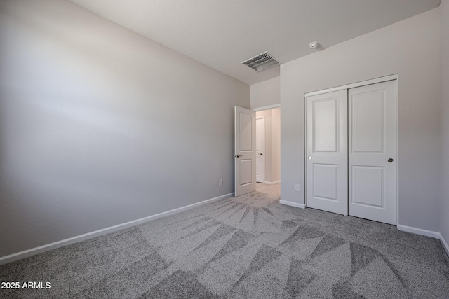 19115 N Los Gabrieles Way, Maricopa, AZ 85138 - unfurnished bedroom featuring carpet, baseboards, and a closet