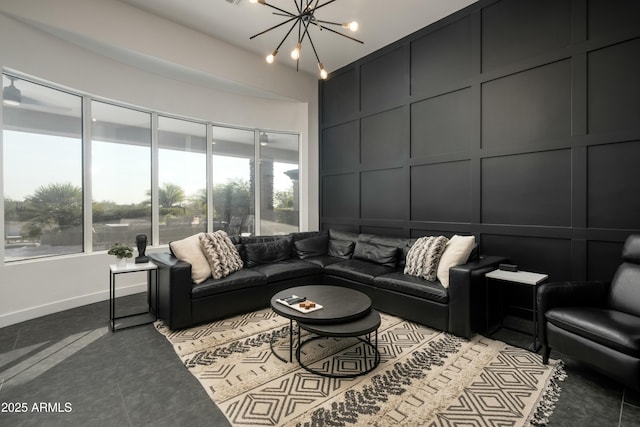 tiled living room with a chandelier