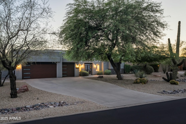 obstructed view of property featuring a garage