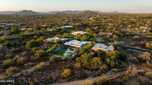 aerial view at dusk with a mountain view