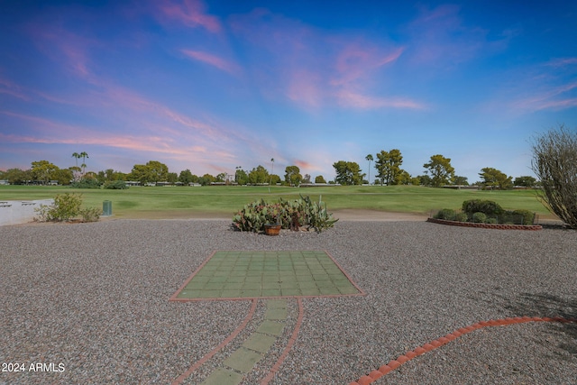 view of yard at dusk