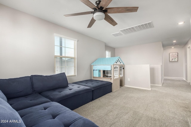 living room featuring baseboards, visible vents, a ceiling fan, carpet floors, and recessed lighting