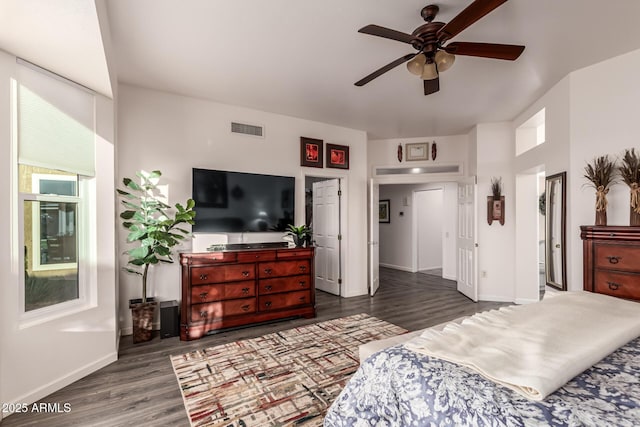 bedroom with dark wood-type flooring and ceiling fan