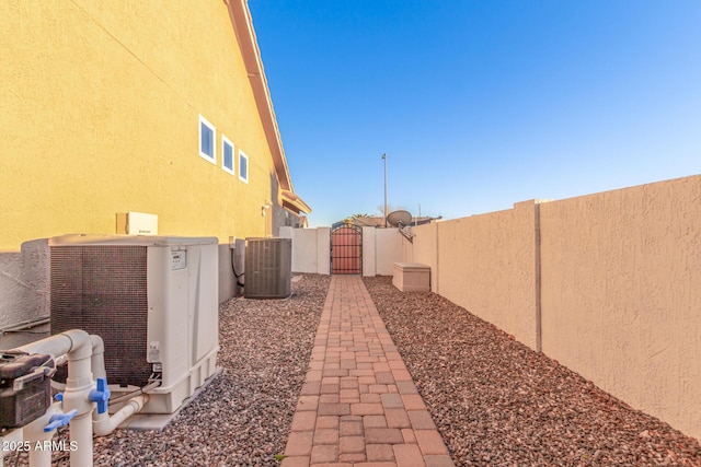 view of side of home featuring cooling unit