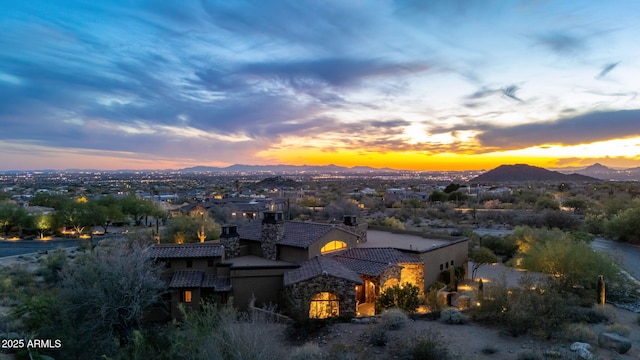 aerial view at dusk with a mountain view