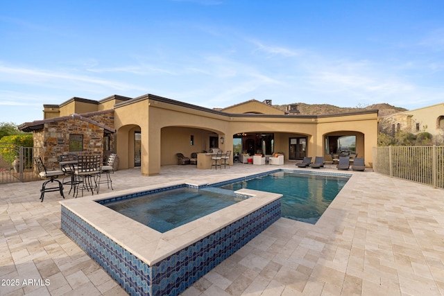 view of swimming pool with fence, outdoor dining space, a patio area, and outdoor lounge area
