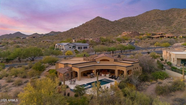 aerial view featuring a mountain view