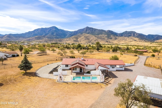 drone / aerial view featuring a mountain view