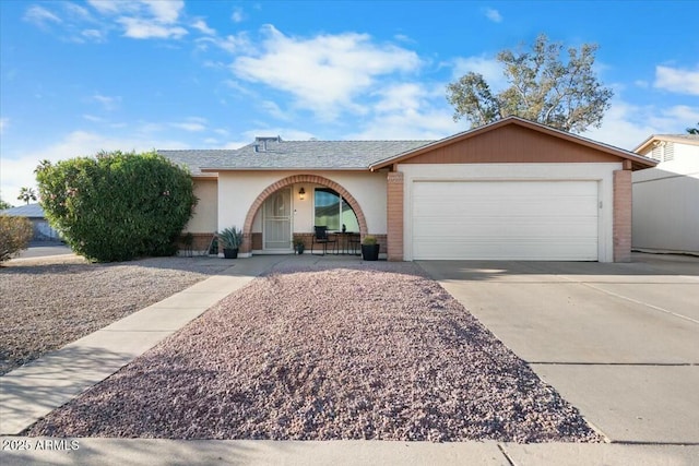 single story home featuring driveway, brick siding, an attached garage, and a shingled roof