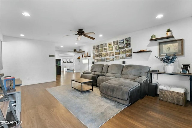 living room with recessed lighting, a ceiling fan, and wood finished floors