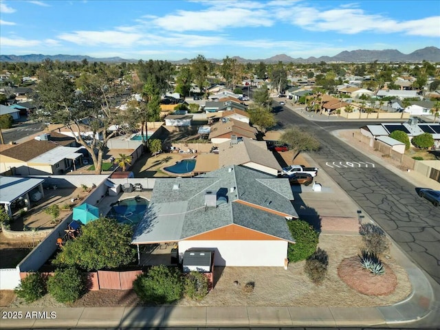 bird's eye view featuring a mountain view and a residential view