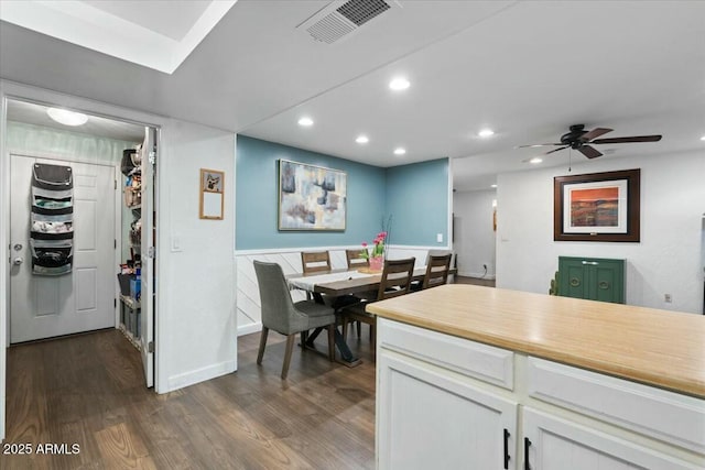 kitchen with visible vents, recessed lighting, dark wood-type flooring, light countertops, and white cabinetry