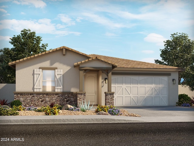 view of front of property with a garage