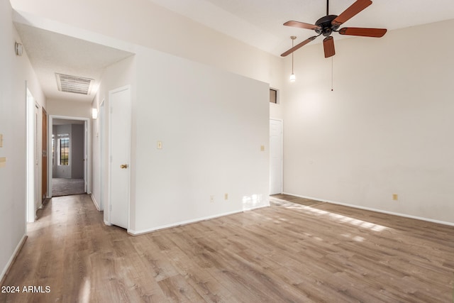 unfurnished room featuring ceiling fan and light wood-type flooring