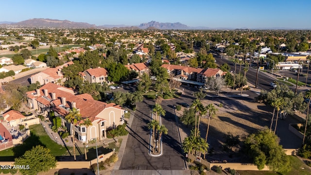 birds eye view of property featuring a mountain view