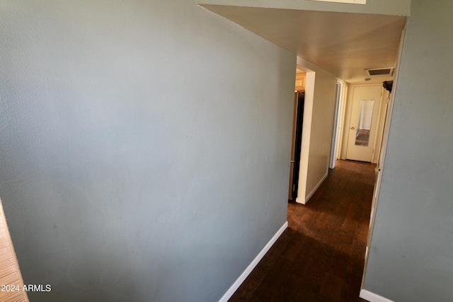 hallway featuring dark hardwood / wood-style floors