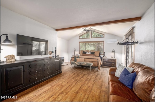 17405 S Shadow Rock Pl, Munds Park, AZ 86017 - bedroom featuring a wall mounted AC and light wood-style flooring