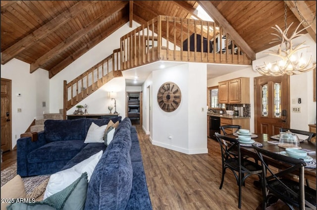 17405 S Shadow Rock Pl, Munds Park, AZ 86017 - living area featuring a wood ceiling with exposed beams, stairway, high vaulted ceiling, wood finished floors, and a chandelier