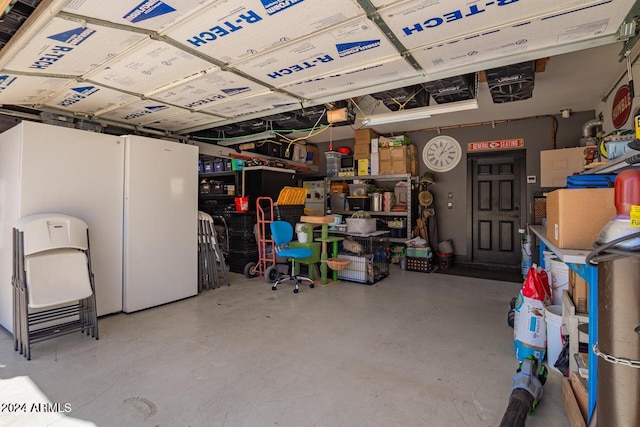 basement with white fridge