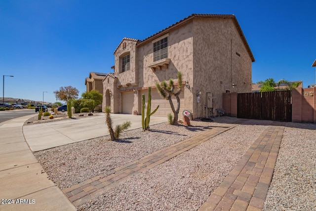 view of front of property featuring a garage