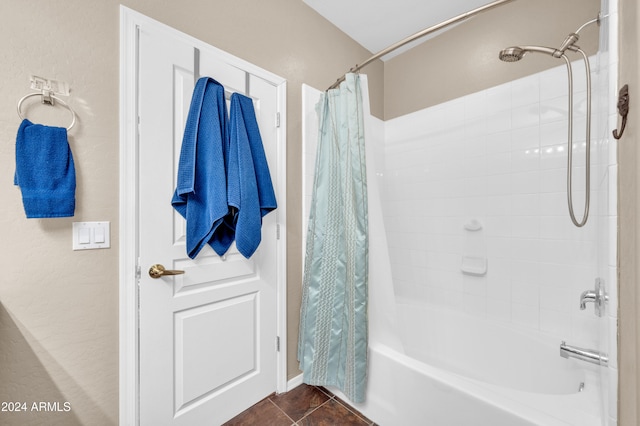 bathroom with tile patterned flooring and shower / bath combination with curtain