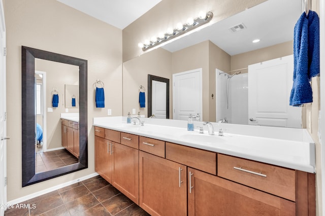 bathroom featuring vanity and walk in shower